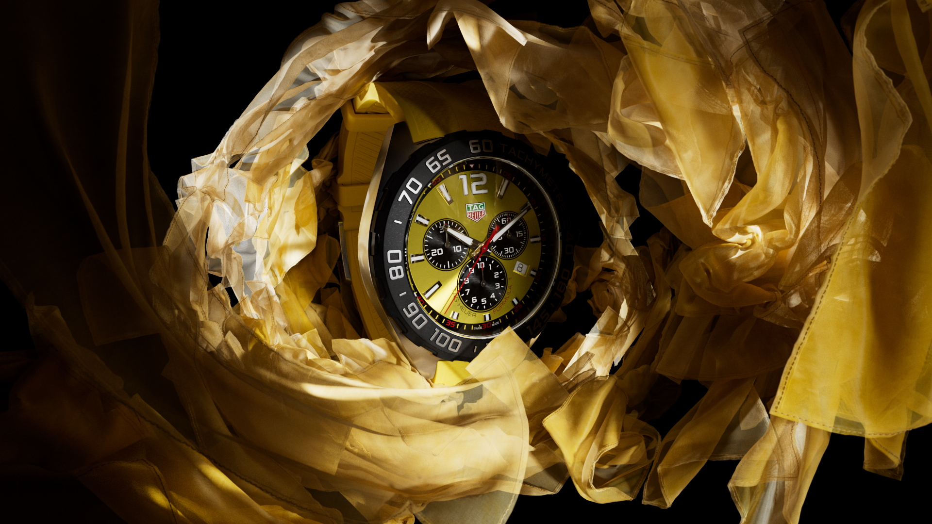 TAG_HEUER_F1_COLOUR_CLOTH_PIECES_007_AI.from_top_25mm_dof_1.0150
